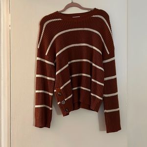 Orange and white sweater